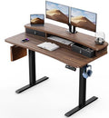 HUANUO 48″ x 24″ Electric Standing Desk with 2 Drawers, C-Clamp Mount Compatible, Height Adjustable Computer Desk, Home Office Stand Up Desk with 4 Preset Heights & 2 Hooks, Walnut by HUANUO