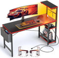 Bestier Gaming Desk with Power Outlets, 44 Inch Led Gamer Desk with 4 Tiers Reversible Shelves, PC Gaming Table with Headset Hook & Side Storage Bag for Bedroom (Black 3D Carbon Fiber) by Bestier